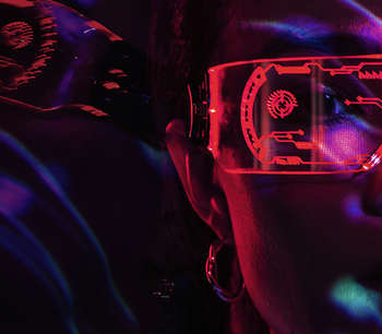 Futuristic photo with a person in neon colour and VR glasses